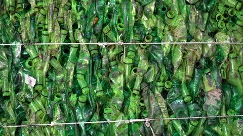View of crushed green plastic bottles in Bogura, Bangladesh. Stock Footage 336411860