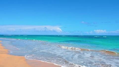 View of crystal clear sea and sandy beach. Stormy sea wave on tropical coast. Stock Footage 309632905