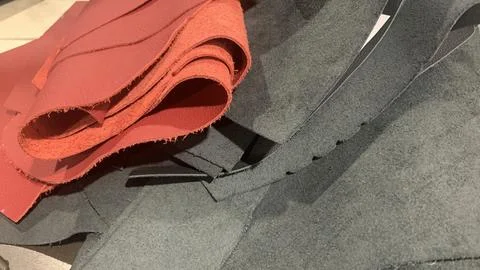 View of the cut part leather in red and black texture Stock Photos