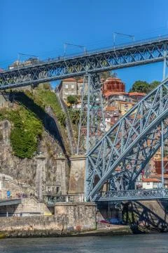 View of D. Luis bridge and Douro river, Porto city downtown as background Stockfoto's