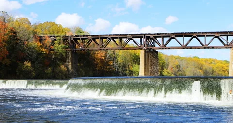 View of dam and railway bridge in autumn, Paris, Canada, timelapse exclusive  Stock Footage 176973785