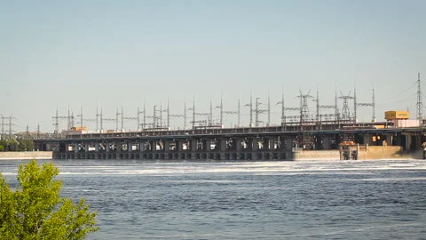 View of the dam on the river. On top is the highway. Sunny day Stock Footage 154269719