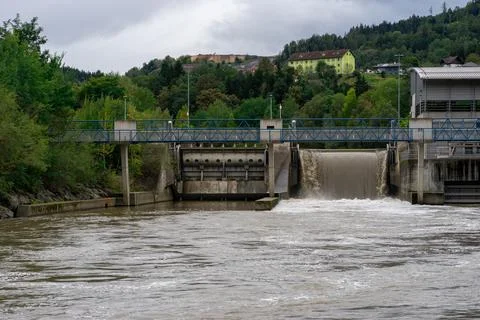 View of a dam on a small mountain river in the Alps Stock Photos