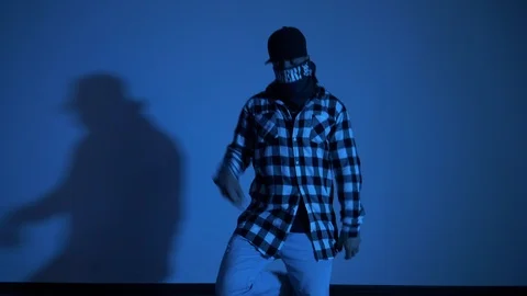 View of dancing in interior on blue background Stock Footage 119037278