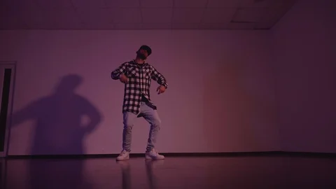 View of dancing in interior on red background 库存影片 119029935