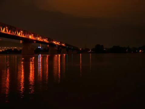 View on the Danube river and the Train bridge in Budapest Hungary after sunse Stock Photos