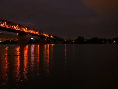 View on the Danube river and the Train bridge in Budapest Hungary after sunse Stock Photos