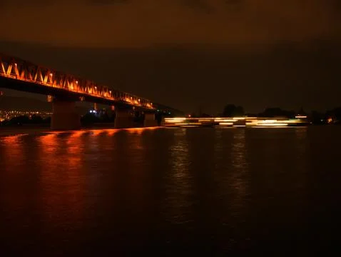 View on the Danube river and the Train bridge in Budapest Hungary after sunse Stock Photos