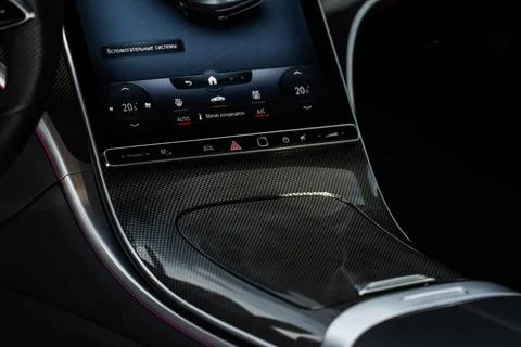 View of dashboard with navigation system in modern car. Translation: "Auxilia Foto stock