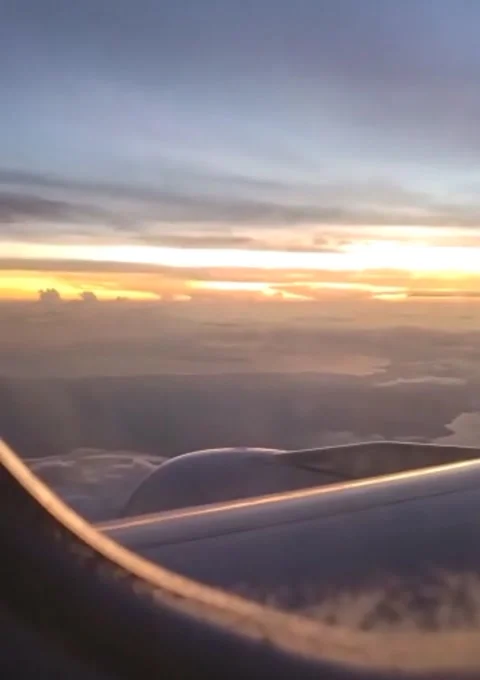 The view at dawn from inside the plane Stock Footage 212625373