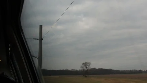 View of a deciduous and pine forest from a train window in winter. Germany Stock Footage 90527760