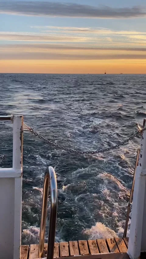 View of the deck during a boat trip, waves during a cruise, against the Stock Footage 271620333