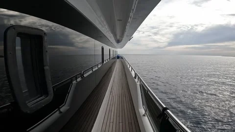 View from the deck of a luxury yacht in the open sea during a cruise Stock Footage 345888647
