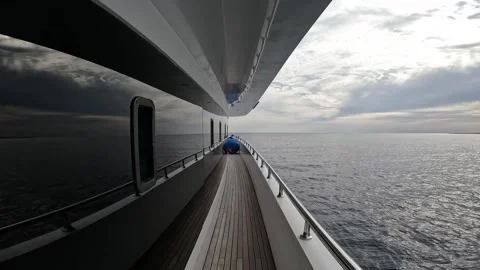 View from the deck of a luxury yacht in the open sea during a cruise Stock Footage 345888655