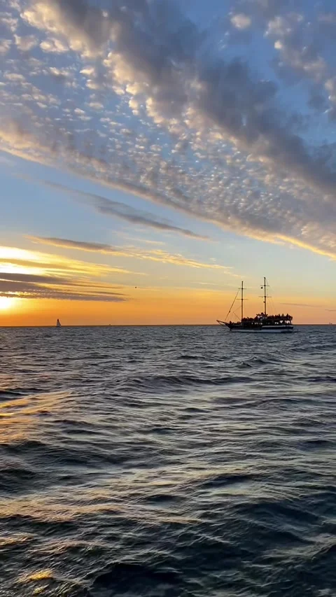 View from the deck of a passing ship during a boat trip, waves during a cruise Stock Footage 271620353