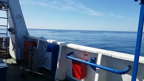 View from deck of ship at sea or sailing through calm ocean. Stock Footage 138756928