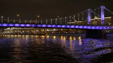 View from the deck of a ship that swims across the river at night in Moscow Stock Footage 73263503