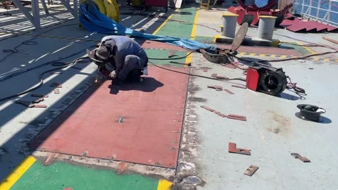View of the deck of the ship, which is standing near the shore during repairs. Stock Footage 201560524