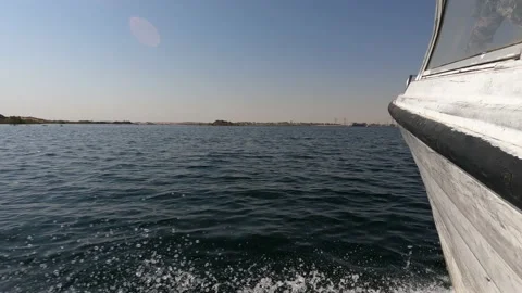 View from the deck of the yacht at the bow, close up. Side view with green sea Stock Footage 142912774