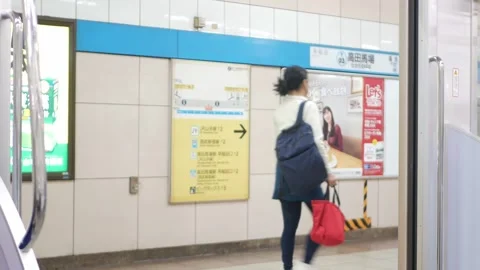 View with defocusing to outside train commuter while train subway door open.. Stock Footage 317219783