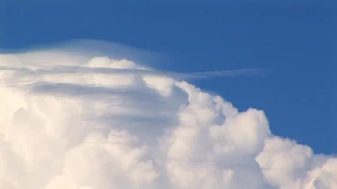 View of dense white cloud with blue sky in background in Needles, California USA Stock Footage 103290164
