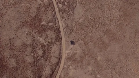 View of Desert Road and van from above - California campspots aerials Stock Footage 85406845