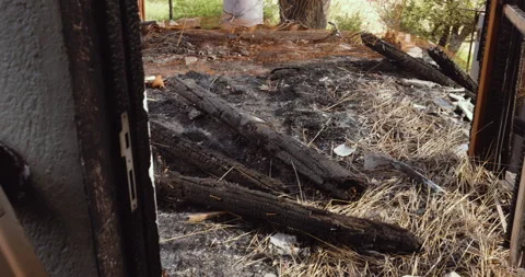 View of a deserted run down building after a fire Stock Footage 235440719