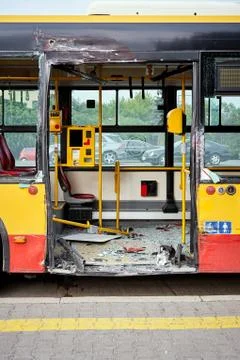 View of devastated city bus after road accident. Stock Photos