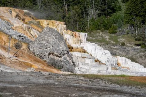 View of the Devil's Thumb and Palette Spring at Mammoth Hot Springs, Yellowst Stock Photos