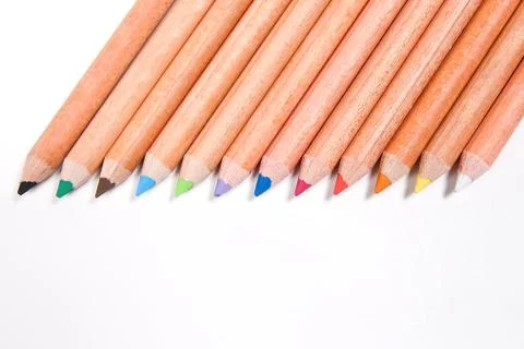 View of different color pencils isolated on the white background. Drawing sup Stock Illustration
