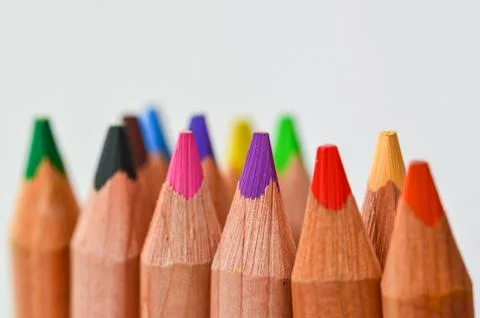 View of different colored crayons on white background Stock Photos