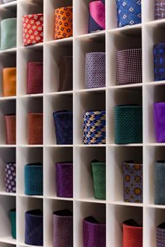 View of different colors ties in showcase. Stock Photos