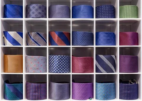 View of different colors ties in showcase. Stock Photos