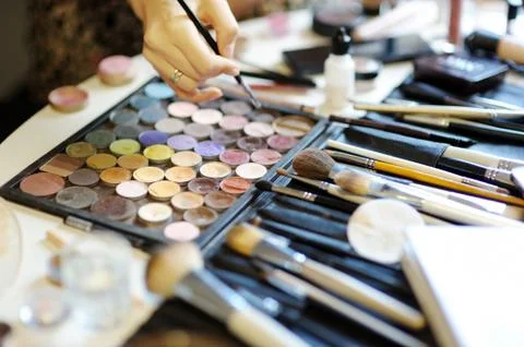 View of different cosmetic brushes for make up on the table on wedding day Stock Photos