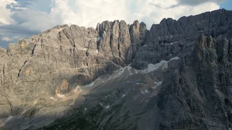 View of different mountain peaks during sunset in the Dolomites Stock Footage 259298937