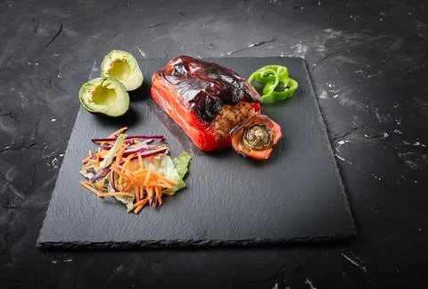 View from diner of exquisite pepper stuffed with rice Stock Photos