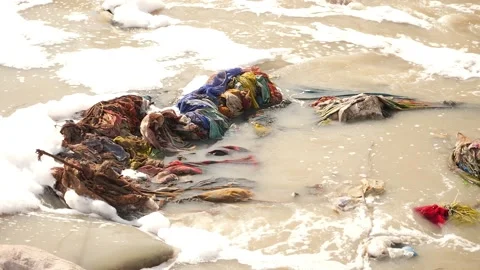View of dirty clothes collected at the center of river 動画素材 148197944