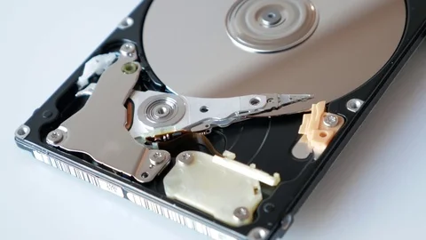 View of disassembled Hard Disk drive spin up and head movement Stock Footage 72929885