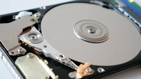 View of disassembled Hard Disk drive spin up and head movement Stock Footage 72931909