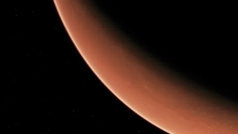 View of a distant planet with a curved surface against a dark background Stock Footage 343937104