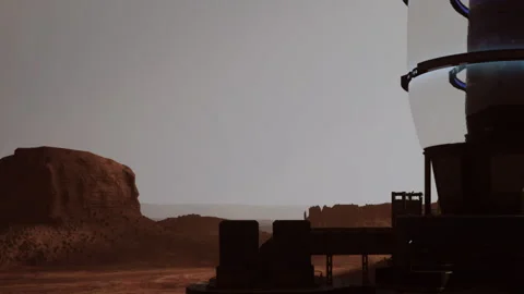 View of a distant rock formation near a human built structure on Mars Stock Footage 344396027