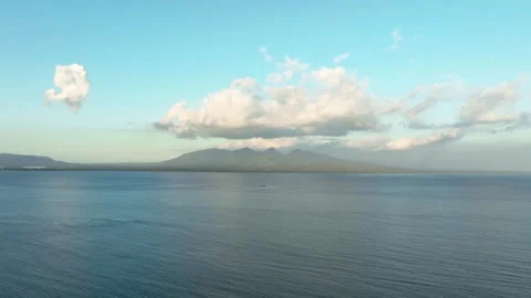 A view of the distant west coast of Bali, seen from East Java near the town of Stock Footage 334633622