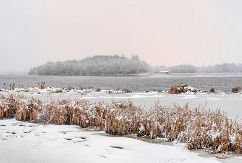 View of the Dnieper river during a cold and snowy winter day. 写真素材