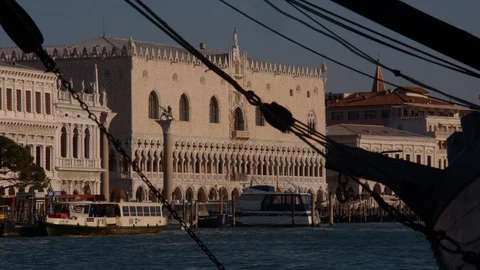 View of the Doge's Palace (Palazzo Ducale) in Venice Italy through mast ropes of 스톡 동영상 128317756