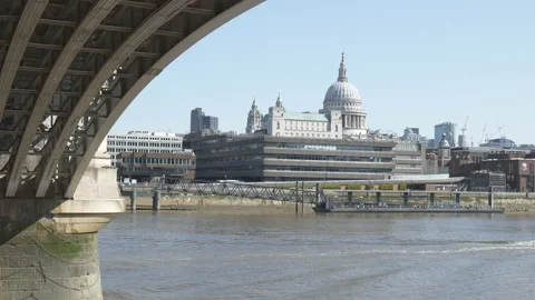 A view of the dome of a cathedral from underneath a bridge. Stock Footage 194483437