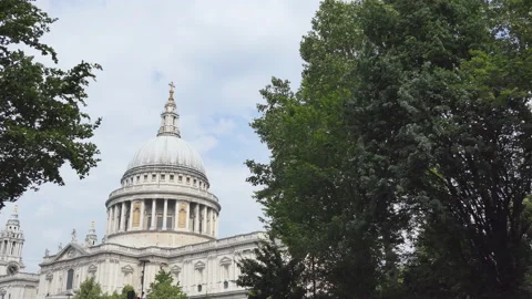 A view of the dome of the st. Paul's cathedral from between two trees. Stock Footage 129716476