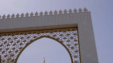 View of the domes of the Sheikh Zayed Mosque through an arched window, Abu Dhabi Stock-Footage 104860519