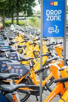 View on Donkey Republic shared city bikes drop zone in Antwerp, Belgium Stock Photos