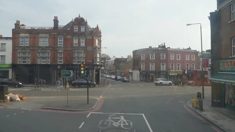 The view from a double-decker bus driving through the streets of London. Stock Footage 106814182