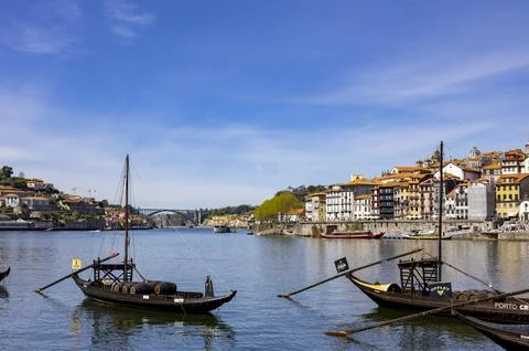 View of Douro river and old Rabelo tradition port wine boats. Stock Photos